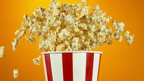 Super Slow Motion of Exploding popcorn from Bucket. Stock Footage 273579817
