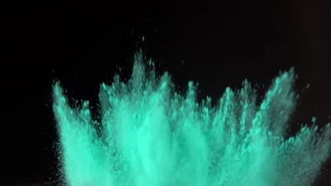 Super slow motion explosion of colorful blue powder on dark isolated background Stock Footage 136548107