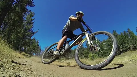 Super Slow Motion Extreme Mountain Biker Riding Downhill Stock Footage