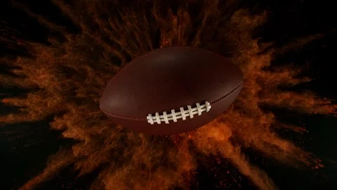 Super Slow Motion of Falling American Football Ball with Powder Explosion Stock Footage 307200878
