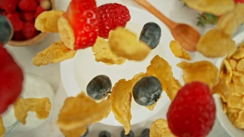 Super Slow Motion of Falling Cereals into Milk. Stock Footage 274190679