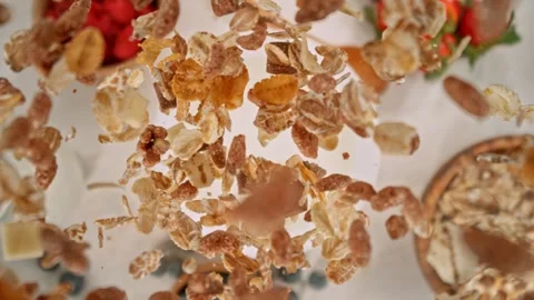 Super Slow Motion of Falling Cereals into Milk. Stock Footage 274190863
