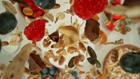 Super Slow Motion of Falling Cereals into Milk. Stock Footage 274191202