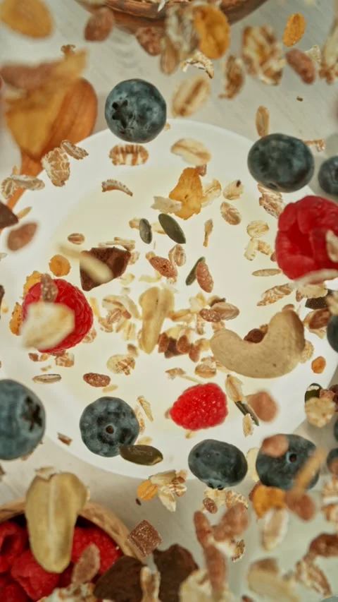 Super Slow Motion of Falling Cereals into Milk. Stock Footage 298719927