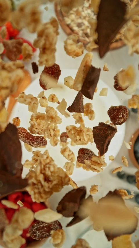 Super Slow Motion of Falling Cereals into Milk. Stock Footage 298860368