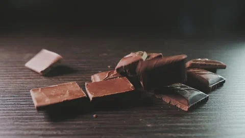 Super slow motion of falling chocolate bars Stock Footage 165991792