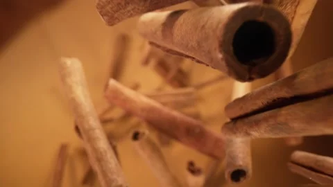Super slow motion of falling cinnamon barks, macro shot. Stock Footage 149218922