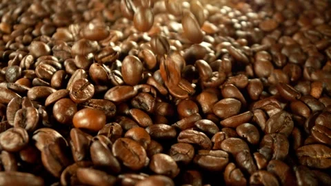 Super Slow Motion of Falling Coffee Beans on Pile. Stock Footage 306648323