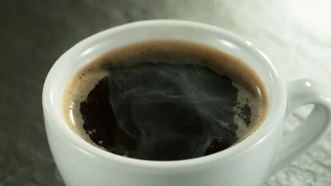Super slow motion of falling drop into coffee with camera motion Stock Footage 235330449