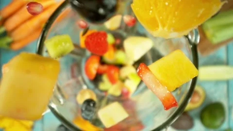 Super Slow Motion of Falling Fruit Pieces into Blender. Stock Footage 277394547