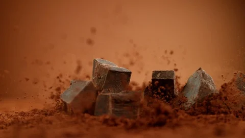 Super slow motion of falling group of raw chocolate pieces Stock Footage 119446417