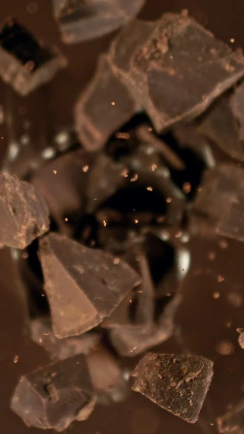 Super Slow Motion of Falling Group of Chocolate Chunks. Stock Footage 286018311