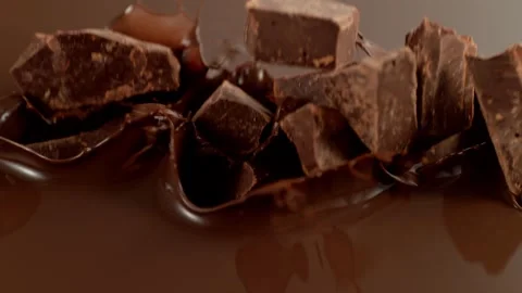 Super Slow Motion of Falling Group of Chocolate Chunks. Stock Footage 297253917