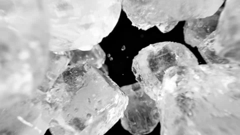 Super slow motion of falling ice cubes isolated on black background Video stock 149006031