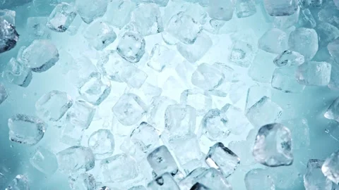 Super slow motion of falling ice cubes separated on blue background Stock Footage 168842580