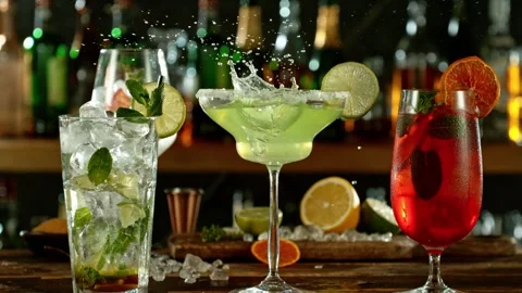 Super slow motion of falling ice cube into margarita with speed motion Stock Footage 243025385