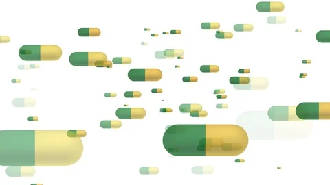 Super slow motion of falling mixed pills on white background Video stock 129032410