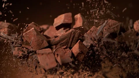 Super slow motion of falling piece of chocolate, 1000fps Stock Footage 139626179