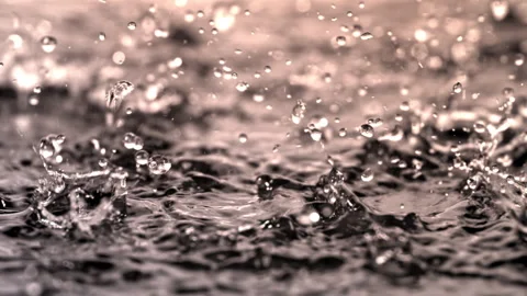 Super slow motion falling raindrops . Filmed on a high-speed camera at 1000 fps. Stock Footage 326169762