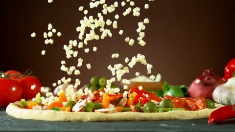 Super slow motion of falling salami on pizza dough. Stock Footage 132006284