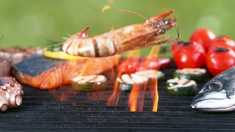 Super slow motion of falling shrimps on grill grid. Stock Footage 154078171