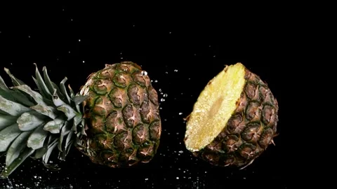 Super slow motion of falling sliced pineapple Stock Footage 253178949