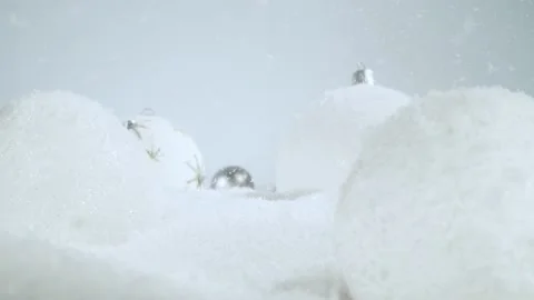 Super slow motion of falling snow with christmas glass balls Stock Footage 218587804