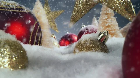 Super slow motion of falling snow with christmas glass balls Stock Footage 218588038