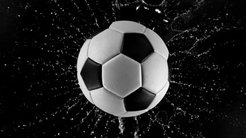 Super Slow Motion of Falling Soccer Ball into Water, Splashing, Top View. Stock Footage 306163382