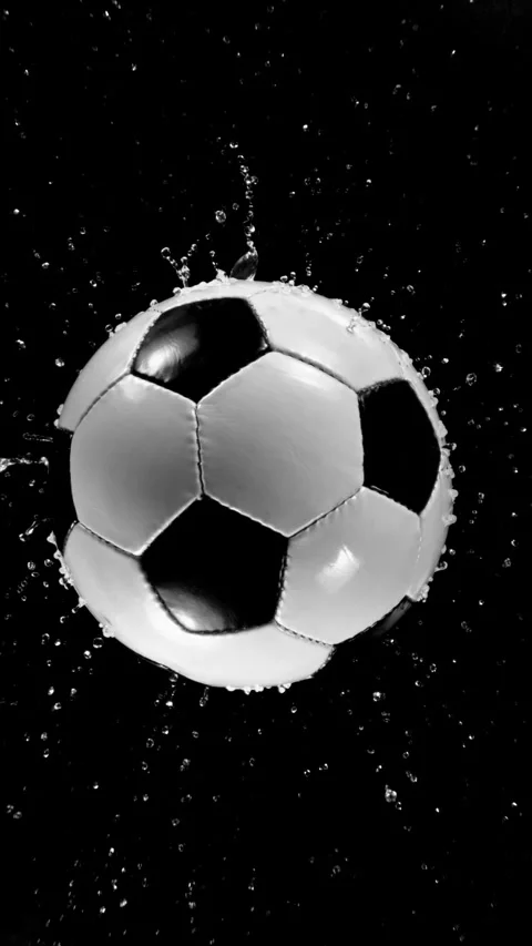 Super Slow Motion of Falling Soccer Ball into Water, Splashing, Top View. Stock Footage 306223649