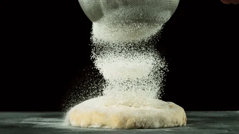 Super slow motion of falling sugar on yeast dough. Stock Footage 131891786
