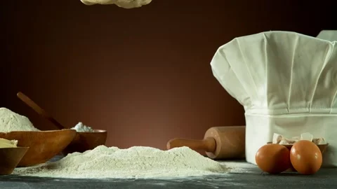 Super slow motion of falling yeast dough into pile of flour. Stock Footage 132005209