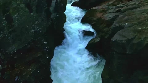 Super slow motion of a fast moving waterfall Stock Footage 142088974