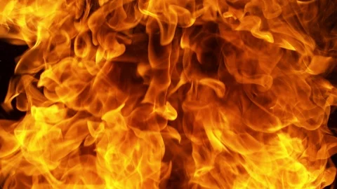 Super slow motion of fire blast isolated on black background. Stock Footage 115634564