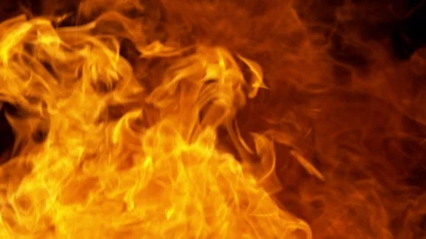 Super slow motion of fire blast isolated on black background. Stock Footage 124482399