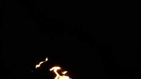 Super slow motion of fire blasts on black background. Filmed on high speed ci Stock Footage 143261998