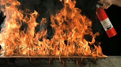 Super Slow Motion Fire Extinguisher Putting Out Flames Stock Footage 1184337