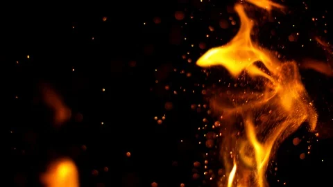 Super slow motion of fire sparks isolated on black background. Stock Footage 95936599