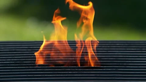 Super slow motion of flames with empty grill grid. Stock Footage 153996567