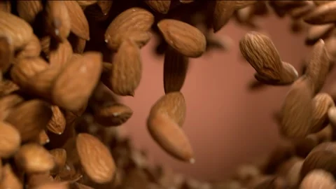 Super slow motion of flying almonds in rotating movement Stock Footage 150157338