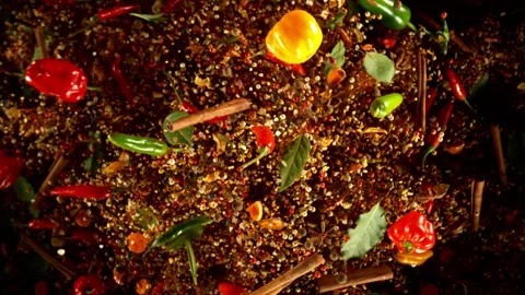Super Slow Motion of Flying and Rotating Spice with Dry Chilli Powder. Stock Footage 312660945