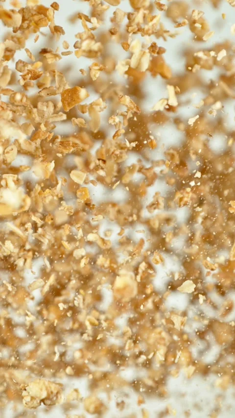 Super Slow Motion of Flying Breakfast Cereals up in the Air. Stock Footage 295028384