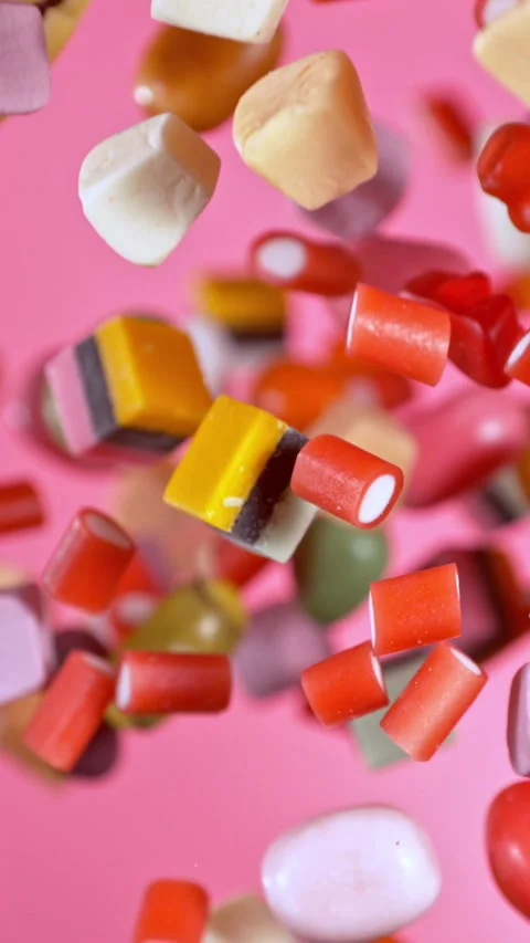 Super Slow Motion of Flying Candies up in the Air. Stock Footage 295028360