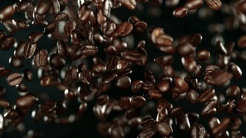 Super slow motion of flying coffee beans. speed ramping effect Stock Footage 119015872