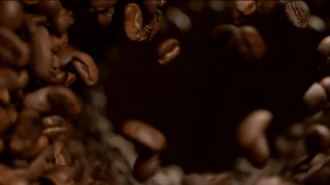 Super slow motion of flying coffee beans, rotating in tunnel Stock Footage 150157304