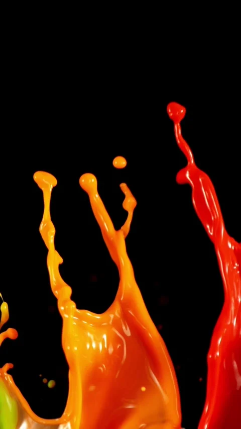 Super Slow Motion of Flying Colored Splashes, Isolated on Black Background. Stock Footage 295943894