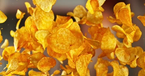 Super Slow Motion of Flying Fried Pepper Potatoes Chips. Stock Footage 293569500