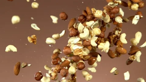 Super slow motion of flying mix nuts collision Stock Footage 132253449