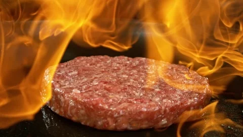 Super Slow Motion of Flying Raw Beef Hamburger Minced Meat. Stock Footage 284350343