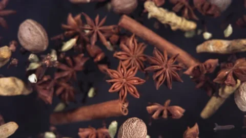 Super slow motion of flying Spices. Filmed in lack background 库存影片 169437885